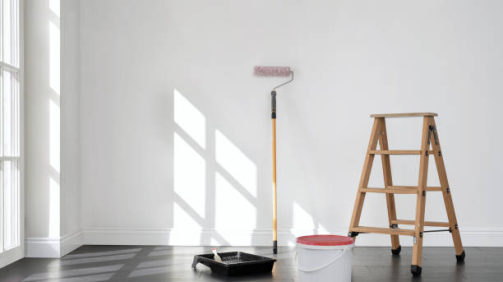 Painting the room, empty apartment ready for renovation, with copy space